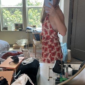 Floral printed romper with low open back & halter top